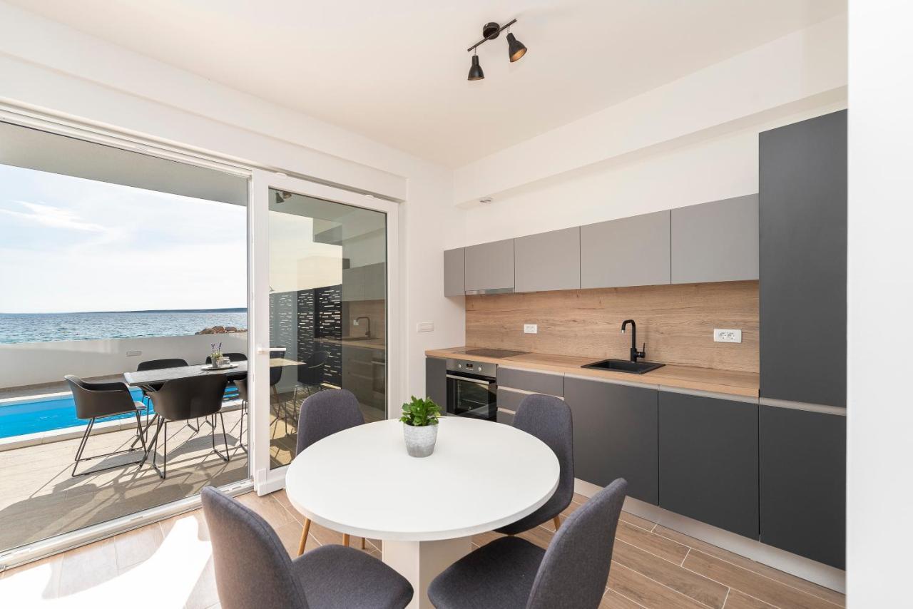 Villa Eni Apartments 1 มันเดร ภายนอก รูปภาพ